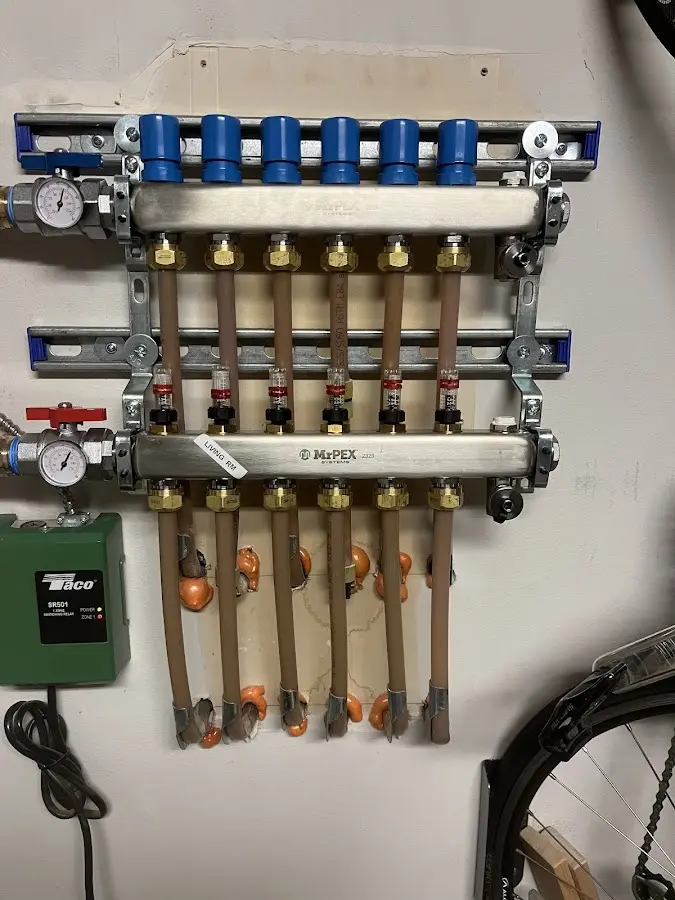 Plumber performing Water Heater Repair at a residential property in La Grange Park